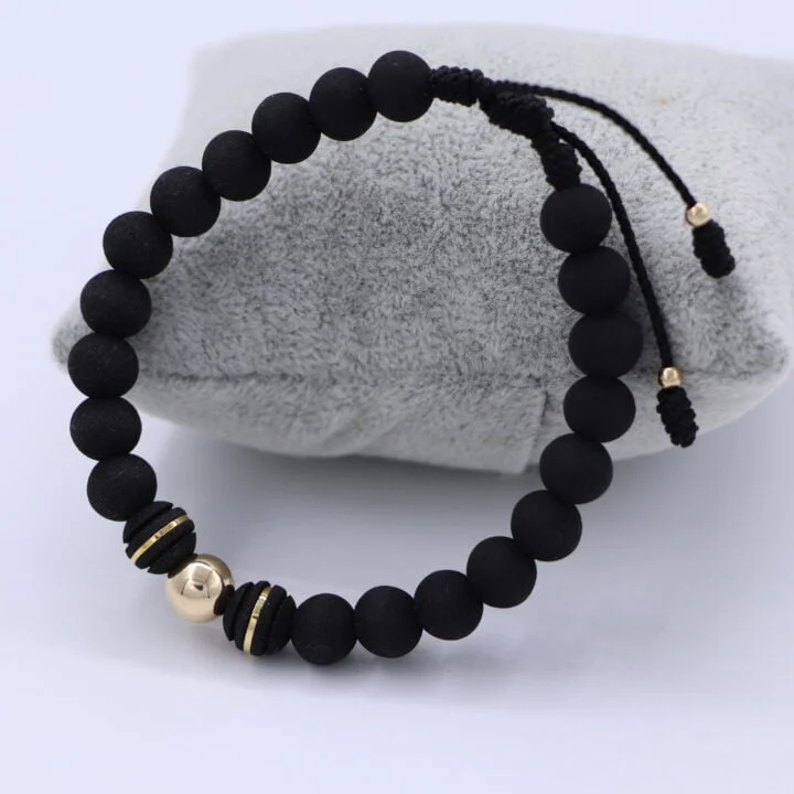 Brazalete negro balín oro laminado 18k