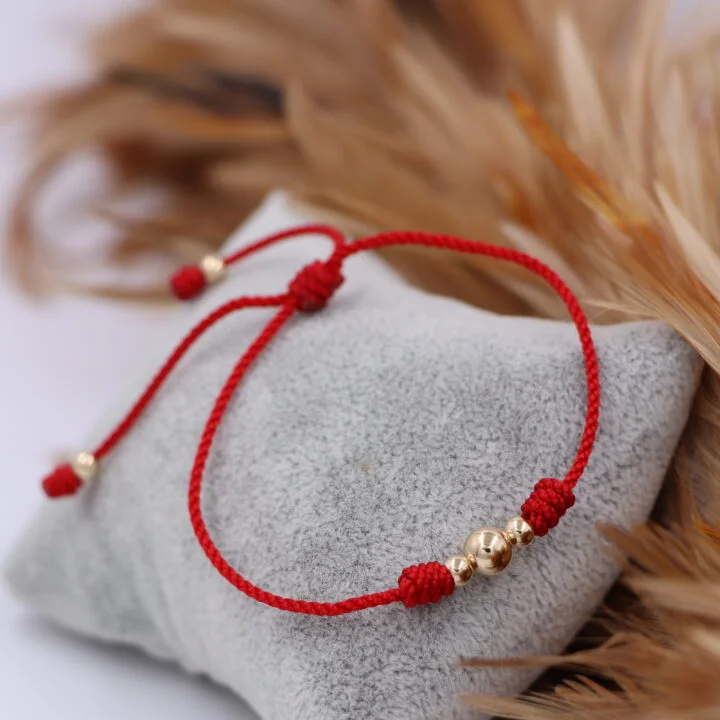 Brazalete rojo balín oro laminado 18k