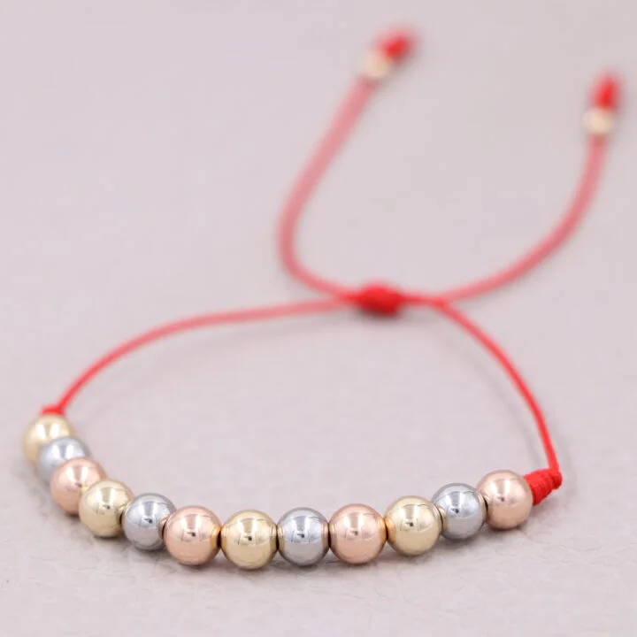 Brazalete rojo tres oros balín oro laminado 18k