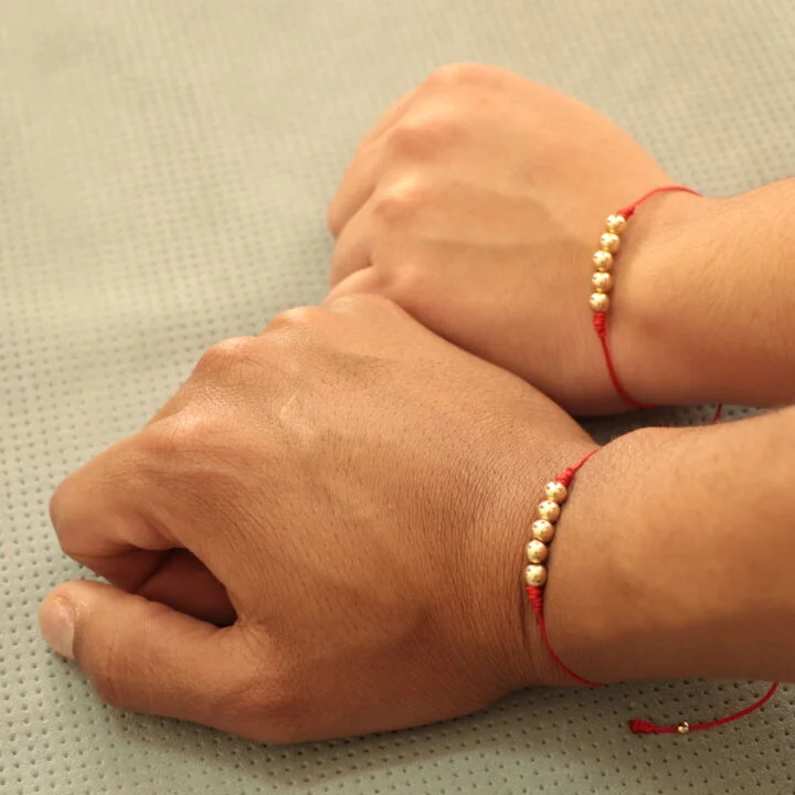Brazalete rojo balín oro laminado 18k
