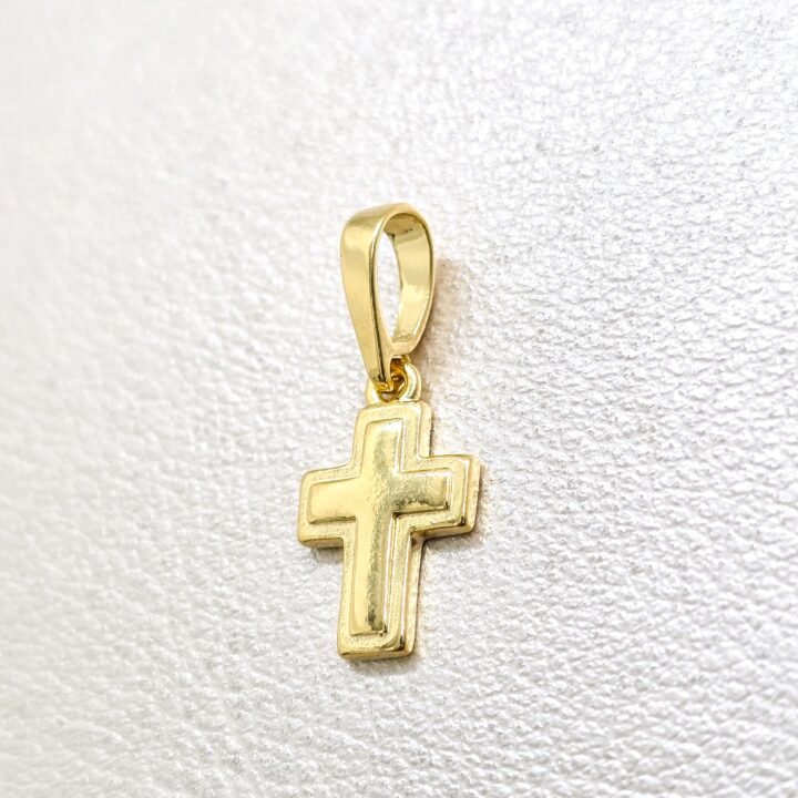 Colgante cruz superpuesta en oro laminado 18k