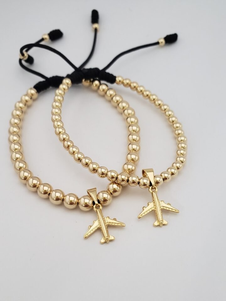 Colgante avión oro laminado 18k