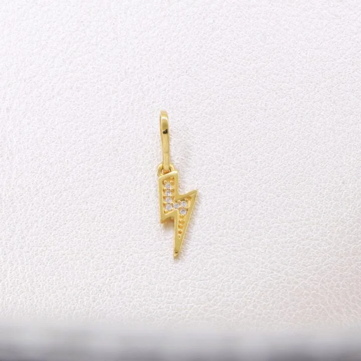 Colgante rayo circonias oro laminado 18k