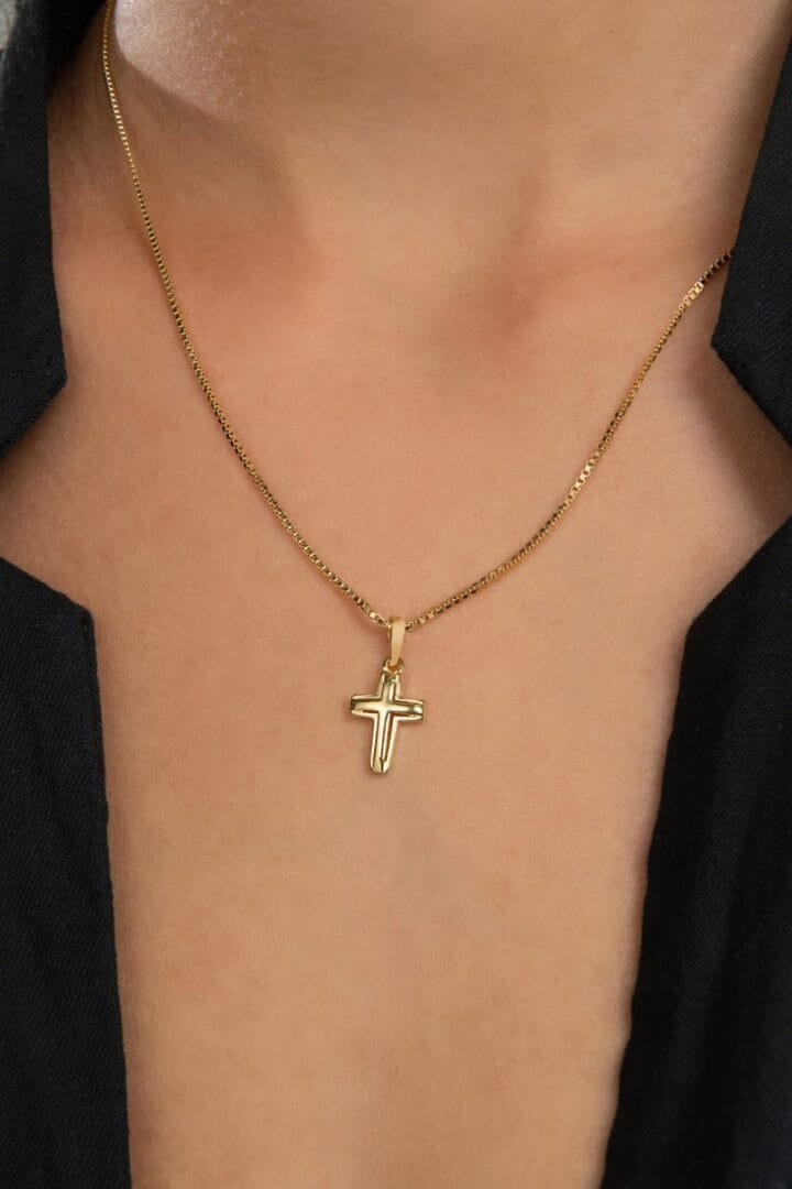 Colgante cruz superpuesta en oro laminado 18k
