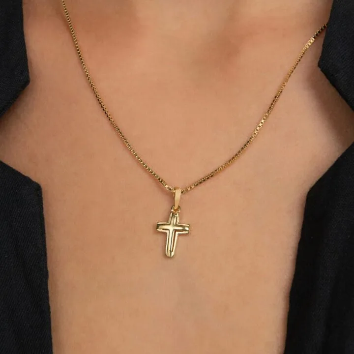 Colgante cruz superpuesta en oro laminado 18k