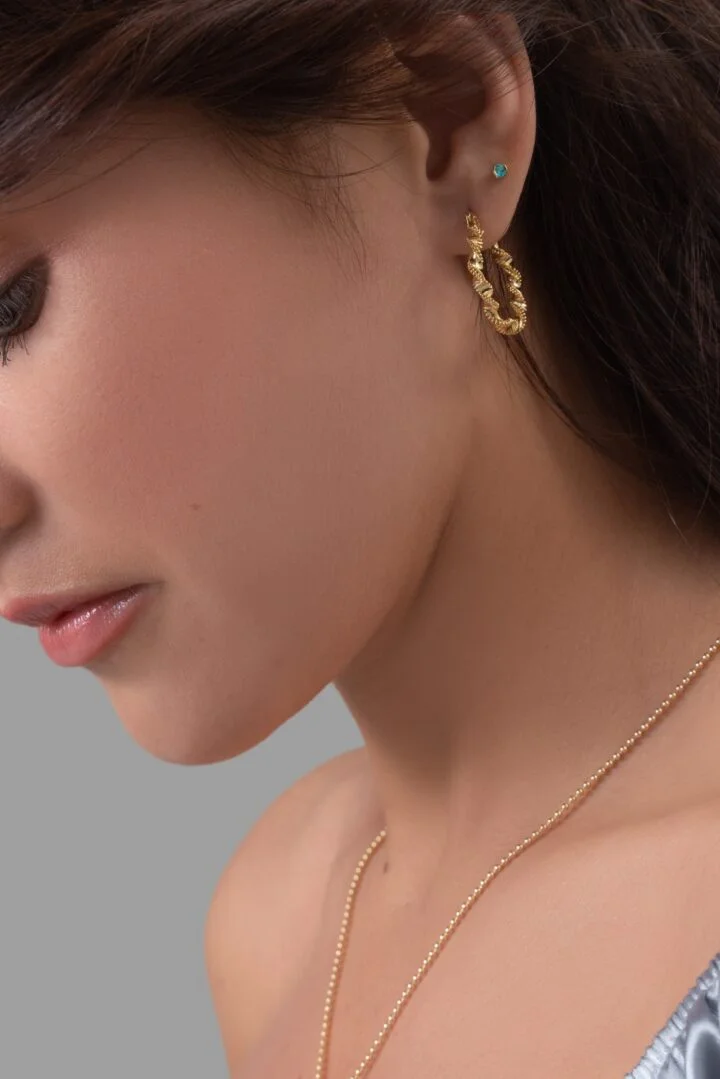 Aros entrelazados oro laminado 18k