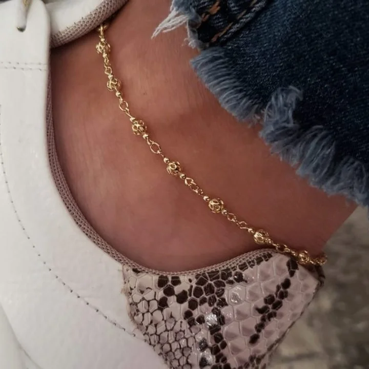 Tobillera bolitas oro laminado 18k