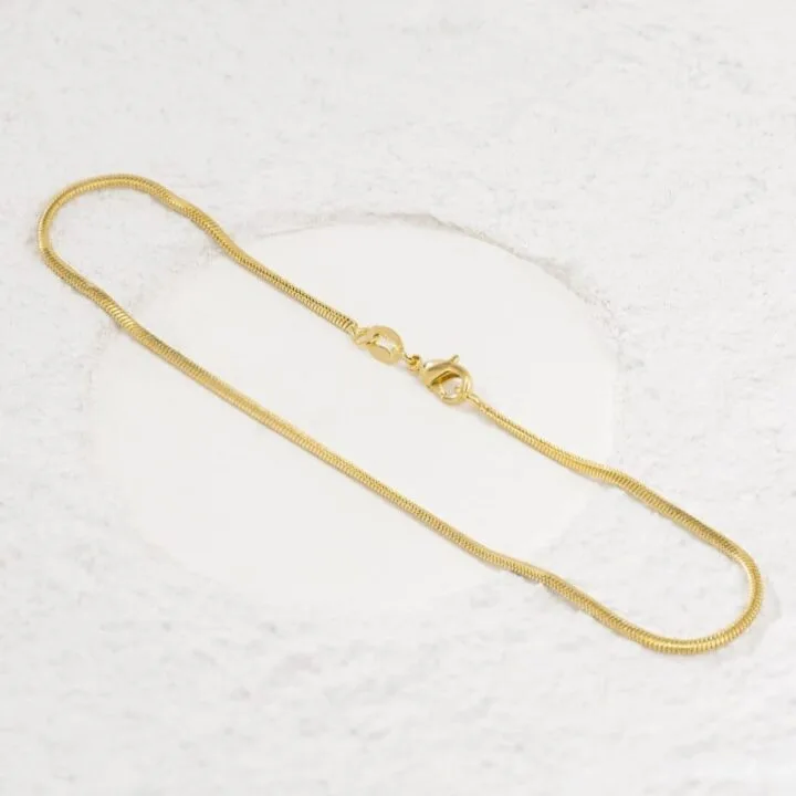 Tobillera piel de serpiente oro laminado 18k