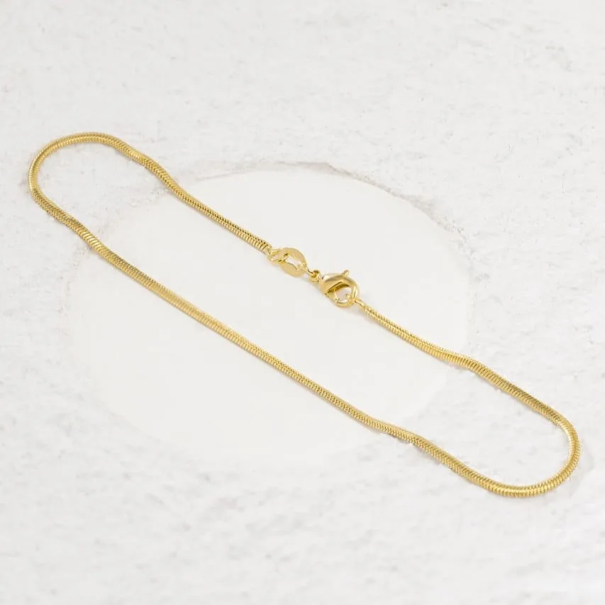 Tobillera piel de serpiente oro laminado 18k