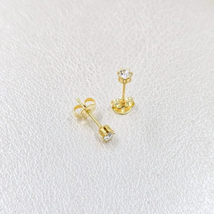 Arete topo chispa circonia oro laminado 18k