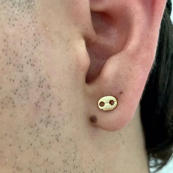 Arete topo Gucci oro laminado 18k