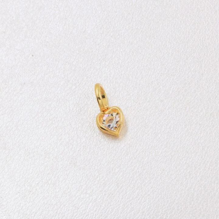 Colgante corazon circonias oro laminado 18k