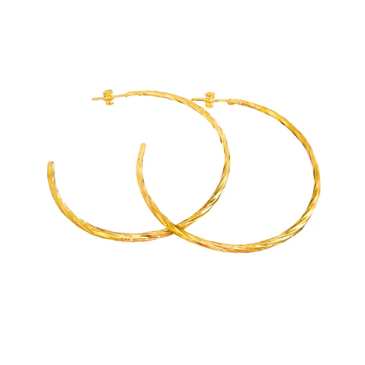 Arete candonga espiral mediana oro laminado 18k