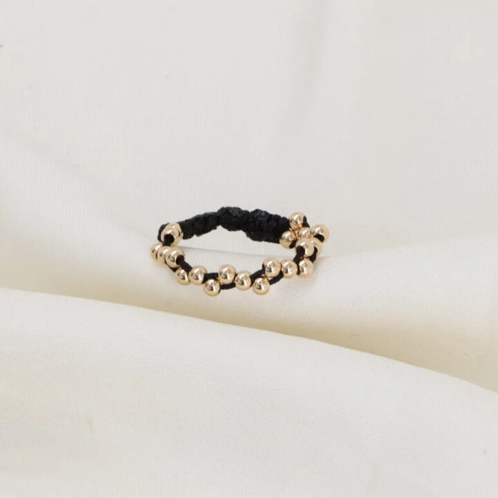 Anillo tejido plano zig zag oro laminado 18k
