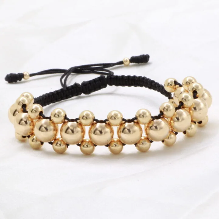 Brazalete Negro con Balin Liso Oro Laminado 18k