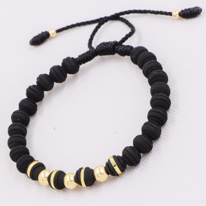 Brazalete negro balín oro laminado 18k