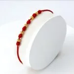 Brazalete clásico con nudos oro laminado 18k