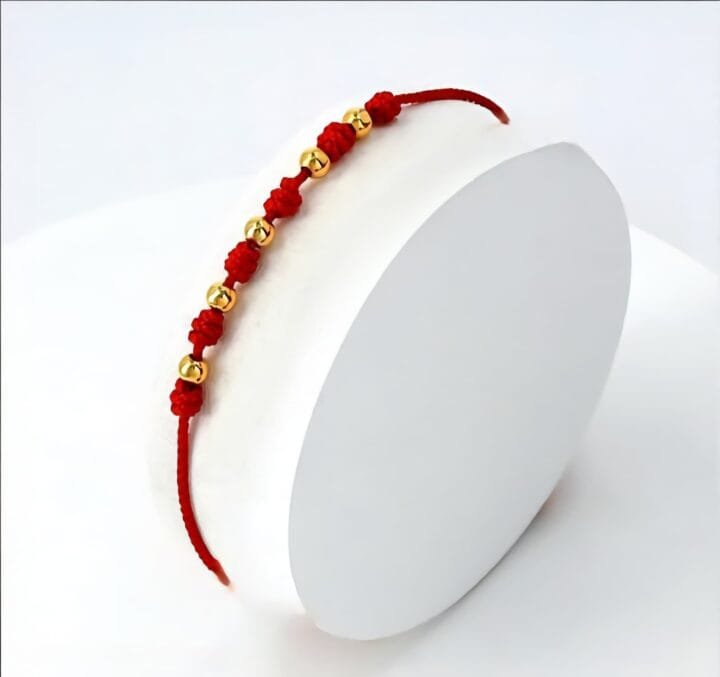 Brazalete clásico con nudos oro laminado 18k